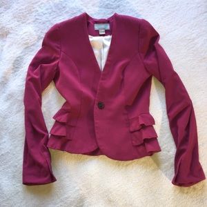 Pink blazer with feminine ruffles